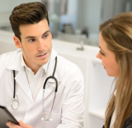 woman having a consultation with a male doctor